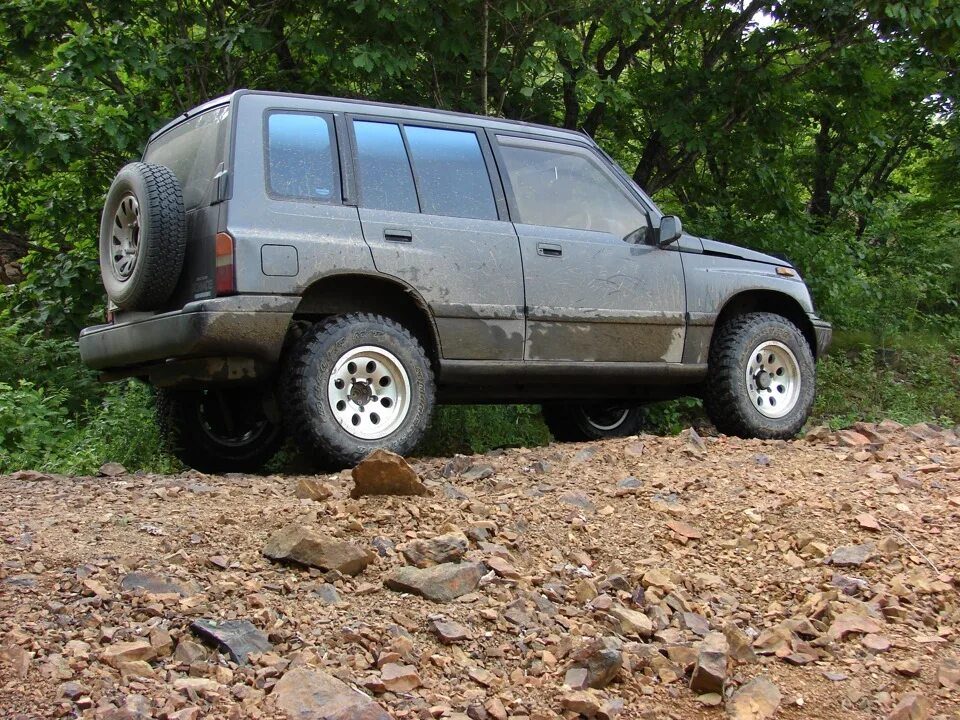Сузуки эскудо 1997 колеса. Эскудо на 31 колесах. Suzuki escudo 33 колеса. Резина 235 75 15 на эскудо. Suzuki escudo колеса.