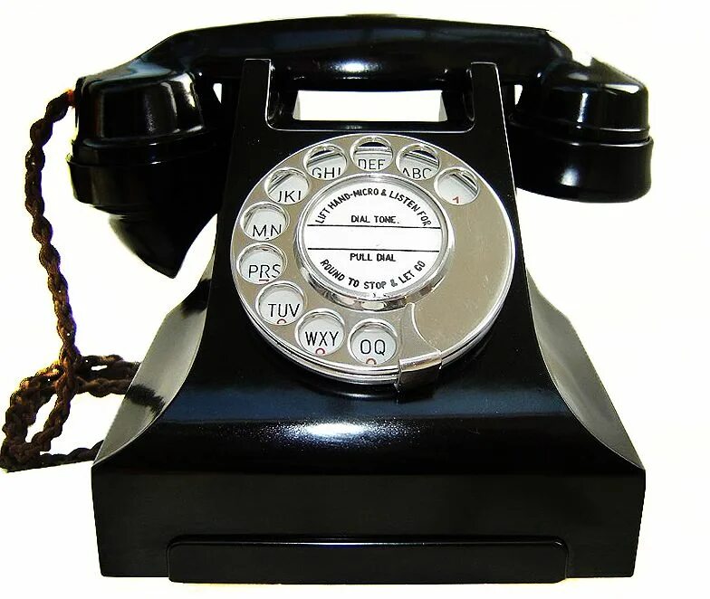 Телефон 18 ru. Rotary Dial Phone. Старый телефон. Телефонный аппарат с дисковым набором номера. Первый дисковый телефон.