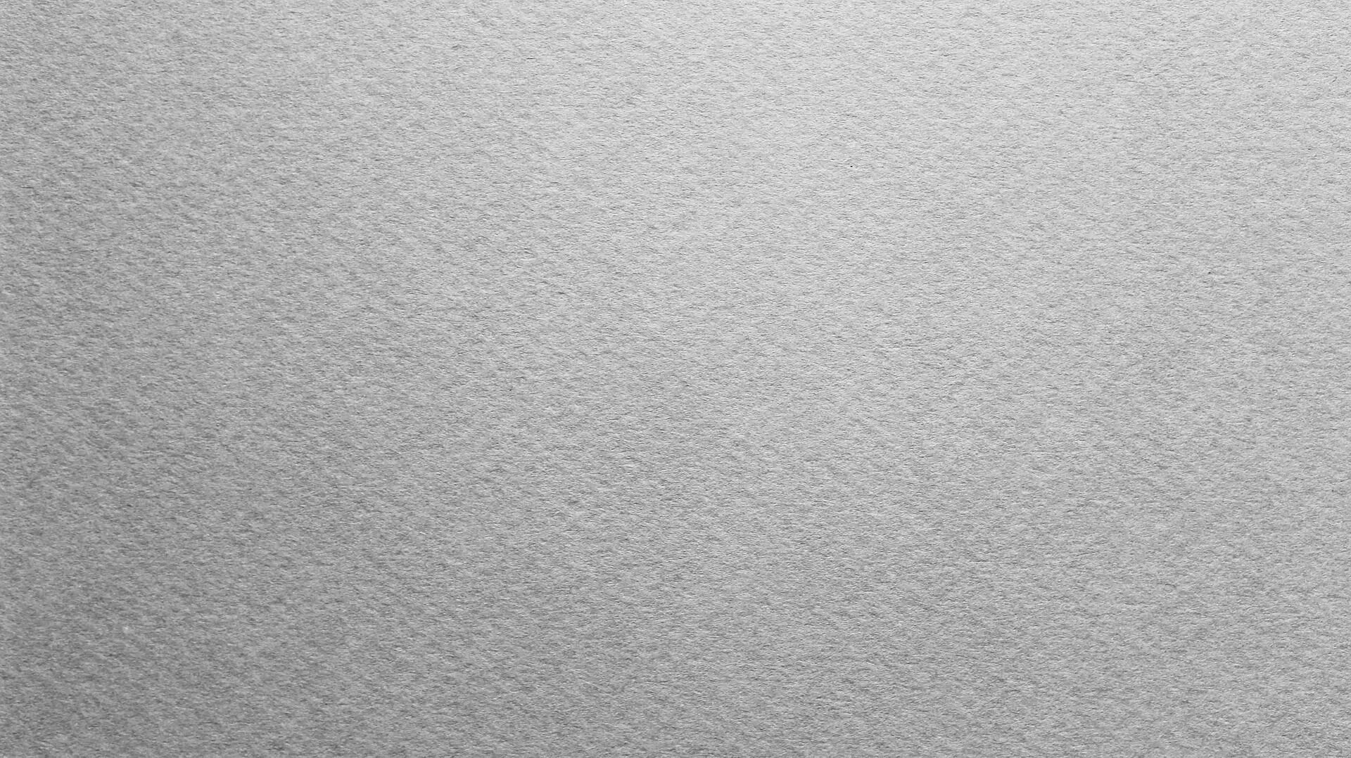 Лист бумаги на столе. Плотный пустой. Плотный пустой. Коричневая текстурная бумага. Фактура акварельной бумаги.