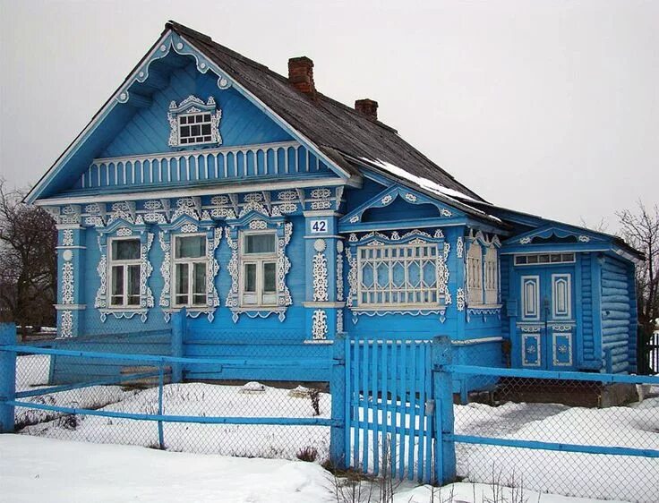 The Resilient Pagans of Russia House in the woods, Blue shutters, Russia