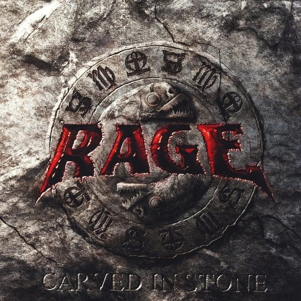 Carved in stone. Rage Carved in Stone 2008 CD диск. Группа Rage. Rage группа логотип. Rage группа обложки.