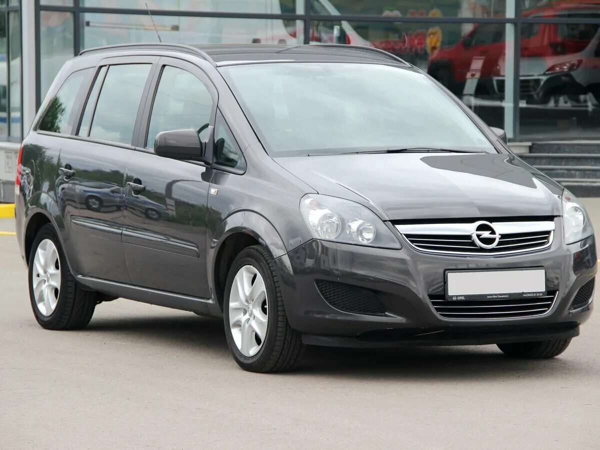 Opel Zafira b Рестайлинг. Опель Зафира 2012 года. Опель Зафира б Рестайлинг. Зафира б до Рестайлинг.