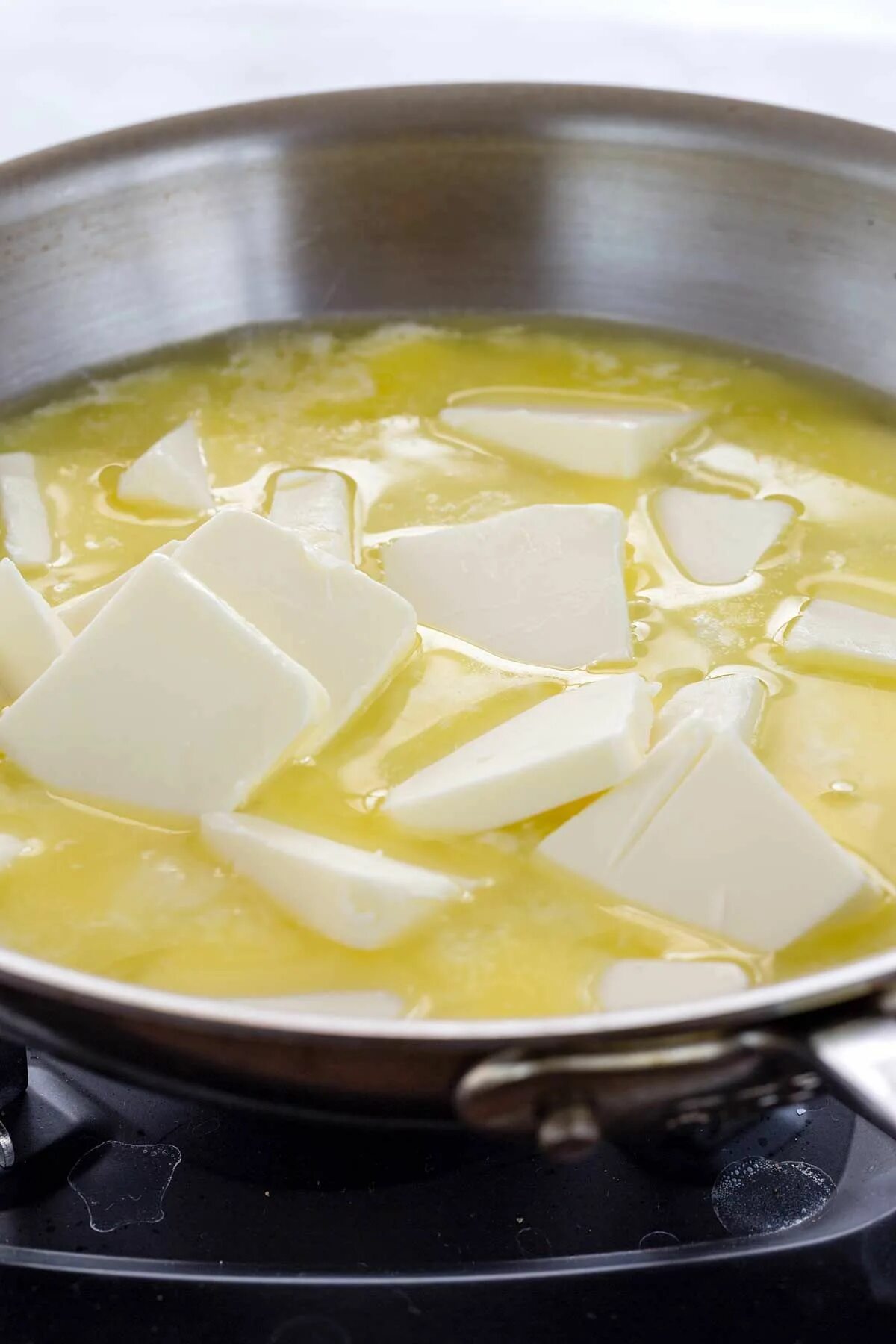 Add butter. Melted butter. erbo butter овощное. butter in pan.