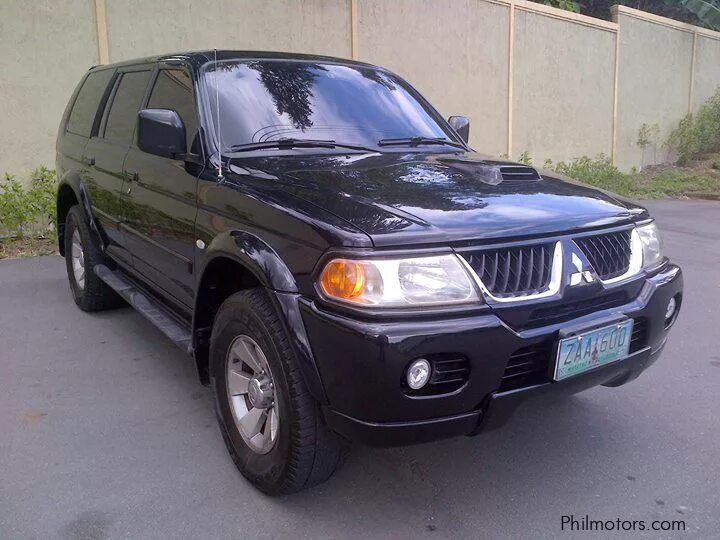 Стекло монтеро спорт. Montero sport 2001 белая. Стекло фары митсубиси паджеро спорт 2. Mitsubishi montero sport 2002 темно синий. Мицубиси монтеро 2005.