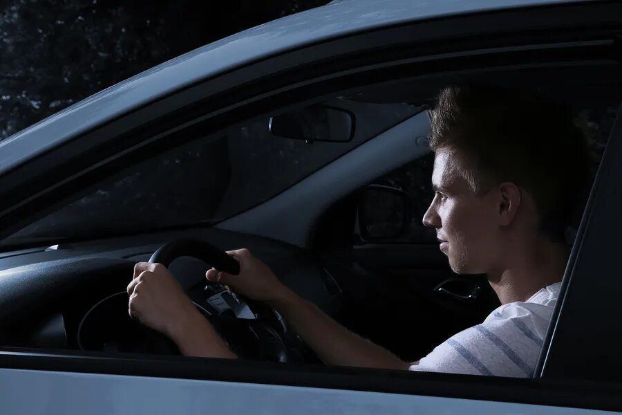 Wait i drive you. Cars driving through the streets at night. should young drivers drive at night listening.