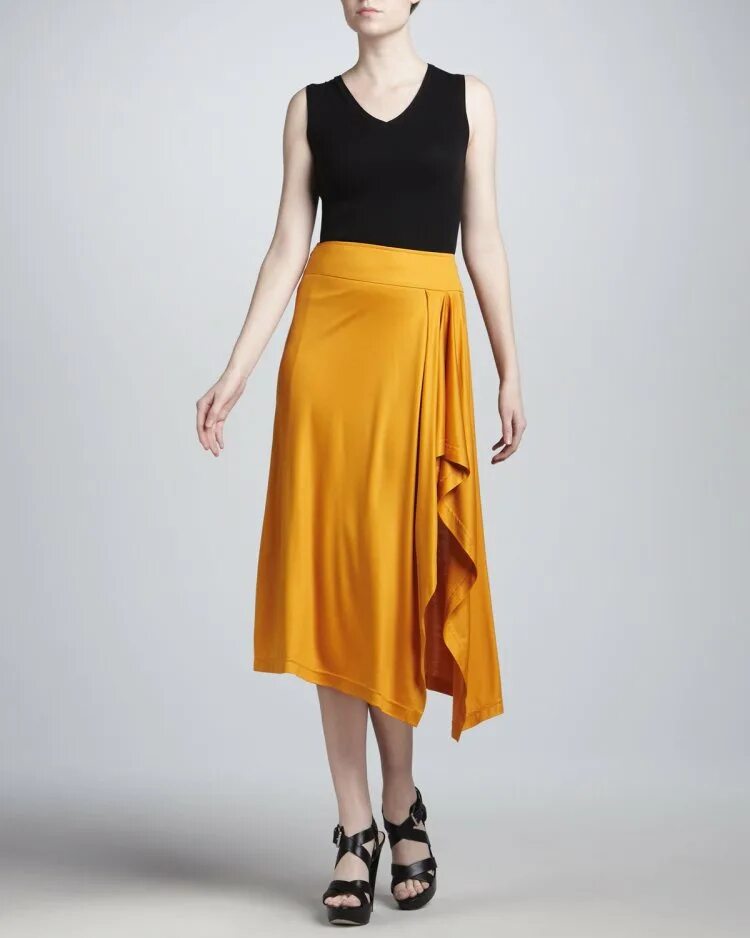 Женская юбка саронг что это. Юбка в стиле саронга. Оранжевая юбка макси прямая.
