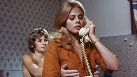 Mark Lester and Britt Ekland in Night Hair Child (1972). 
