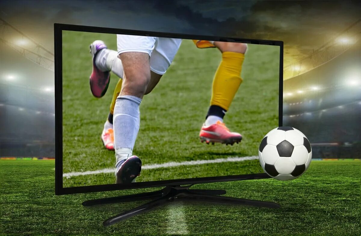 Футбол. Футбольный матч в телевизоре. Спортивный телевизор. Футбол на большом экране.
