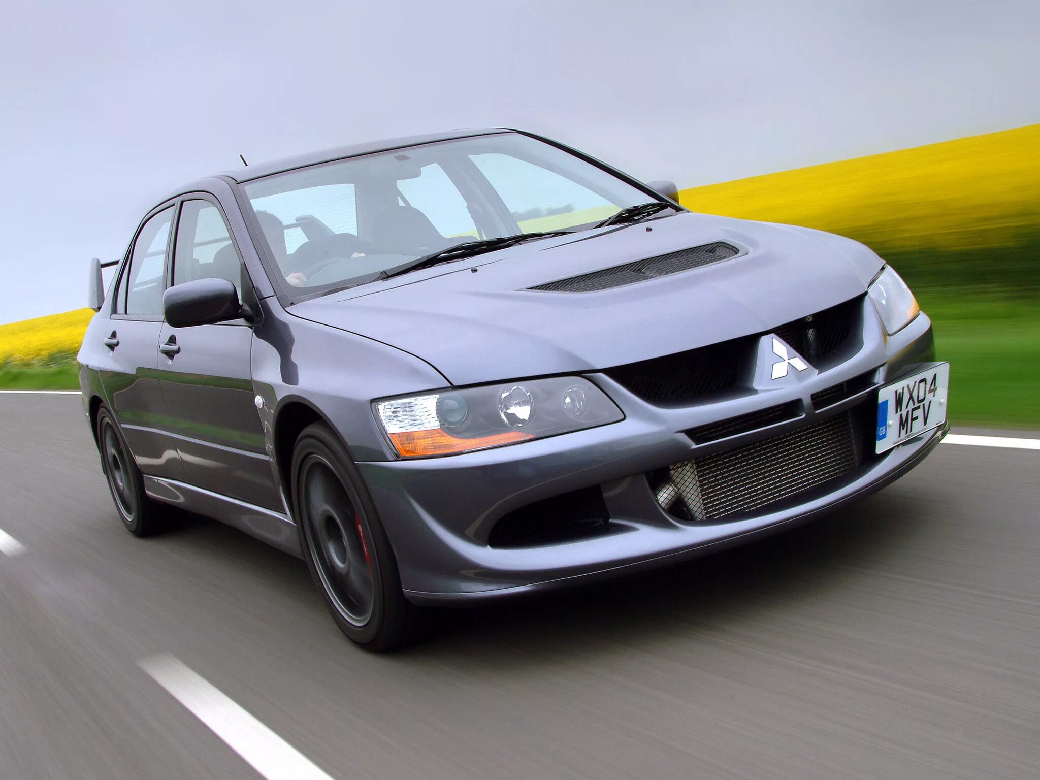 Mitsubishi life. Mitsubishi Lancer 8. Митсубиси Лансер Эволюшн. Mitsubishi Evolution 8. Mitsubishi Lancer Evolution VIII (2003).