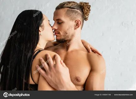 Muscular Man Kissing Brunette Woman Bra 