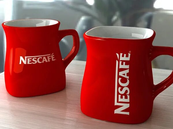 Кружки nescafe. Кружка Нескафе. Чашка Nescafe. Nescafe кружки. Чашка Нескафе красная.