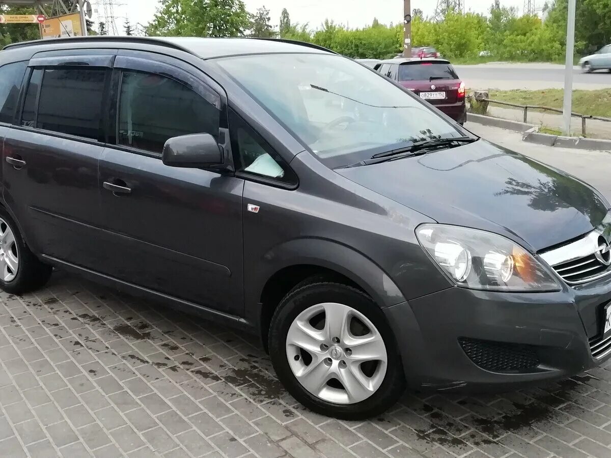 Опель зафира б 2012 года. Opel Zafira 2012. Опель Зафира 2012. Зафира б 2012. Опель Зафира б 2012.