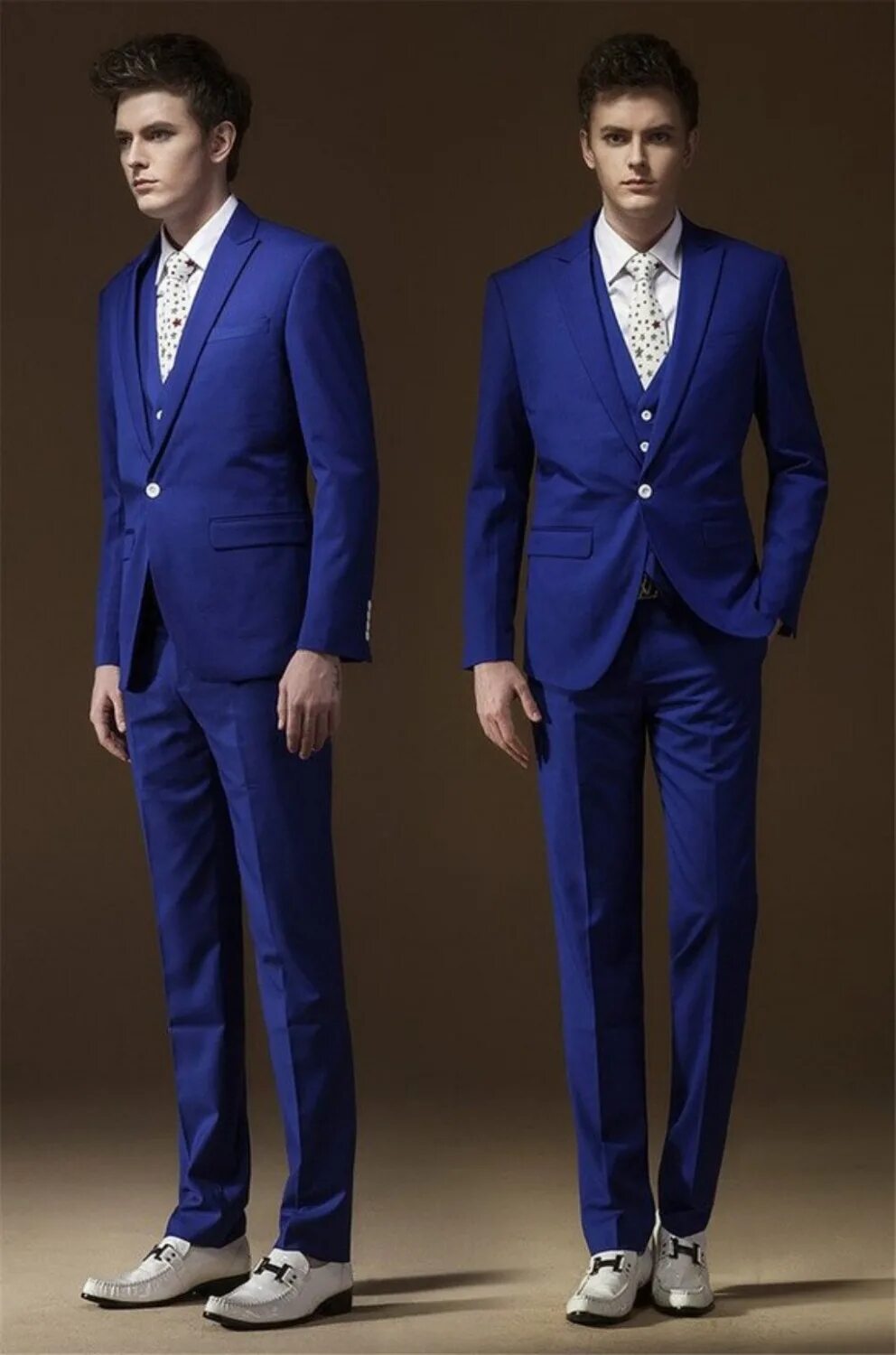 стильный мужчина в костюме. правильный мужской костюм. костюм мужской. массимо дутти мужские костюмы. серый костюм с черным галстуком.