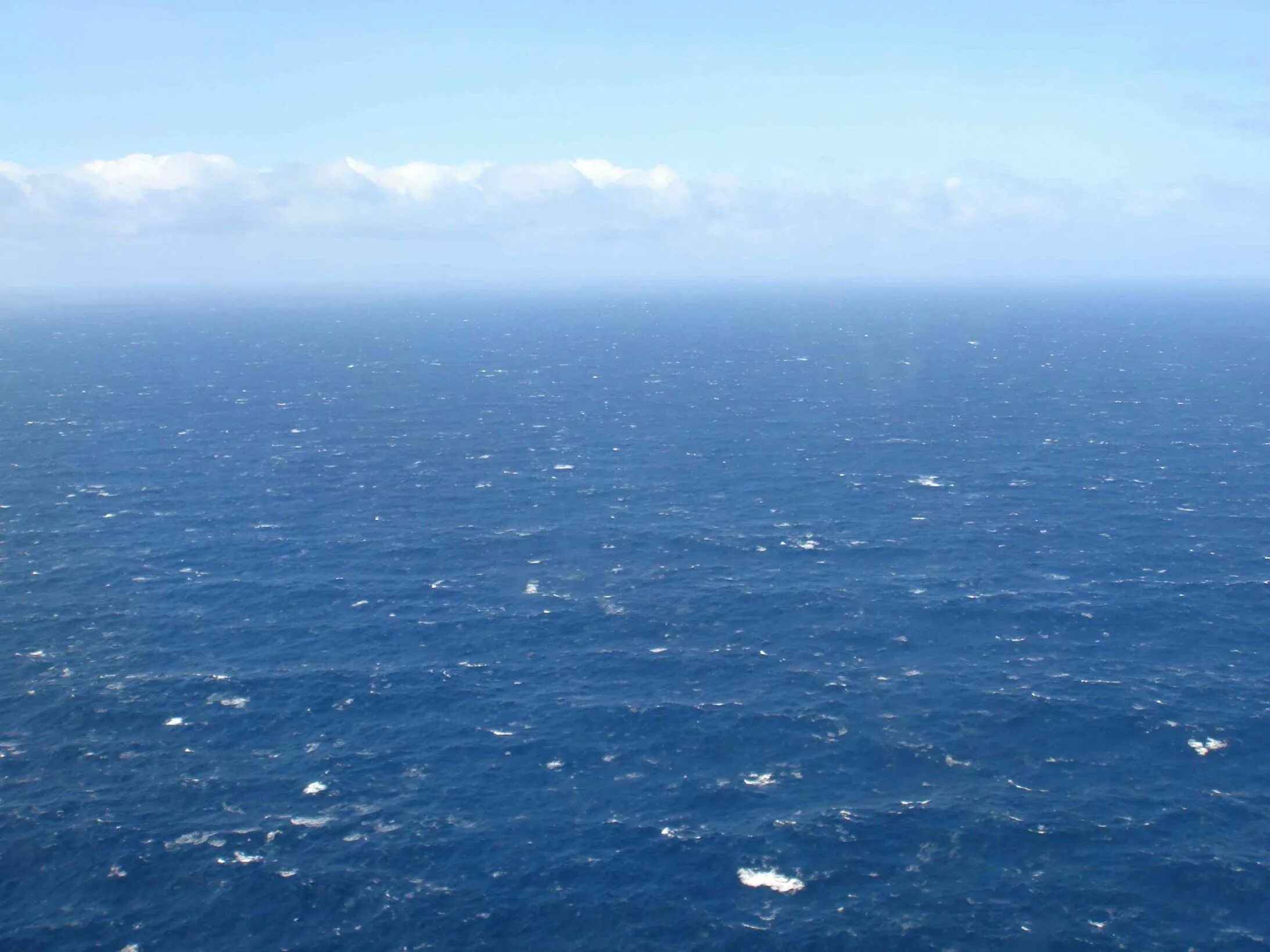 Середина тихого океана. Тихий океан вид с самолета. Вид с самолета на океан. Тихий океан вид сверху. Вид над океаном.
