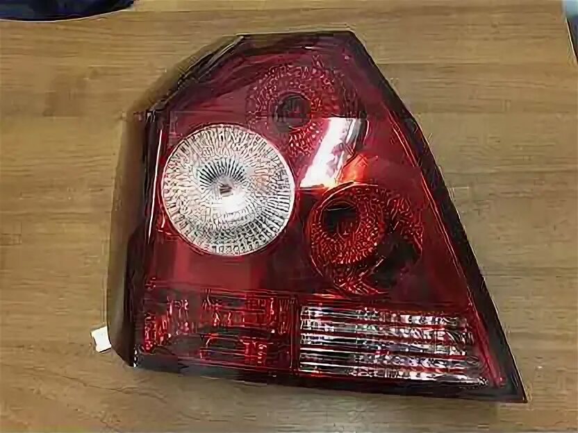 Задняя фара джили мк. Geely mk 2012 задний фонарь. Задняя фара джили мк. Geely mk фонарь задний левый. Задние фонари с крестами.