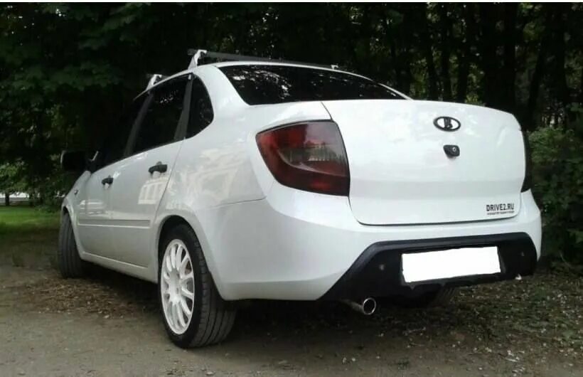 Диффузор на гранту бампер. Диффузор заднего бампера гранта фл седан. Задний диффузор гранта фл. Диффузор на гранту бампер. Накладка заднего бампера 2190 fl.