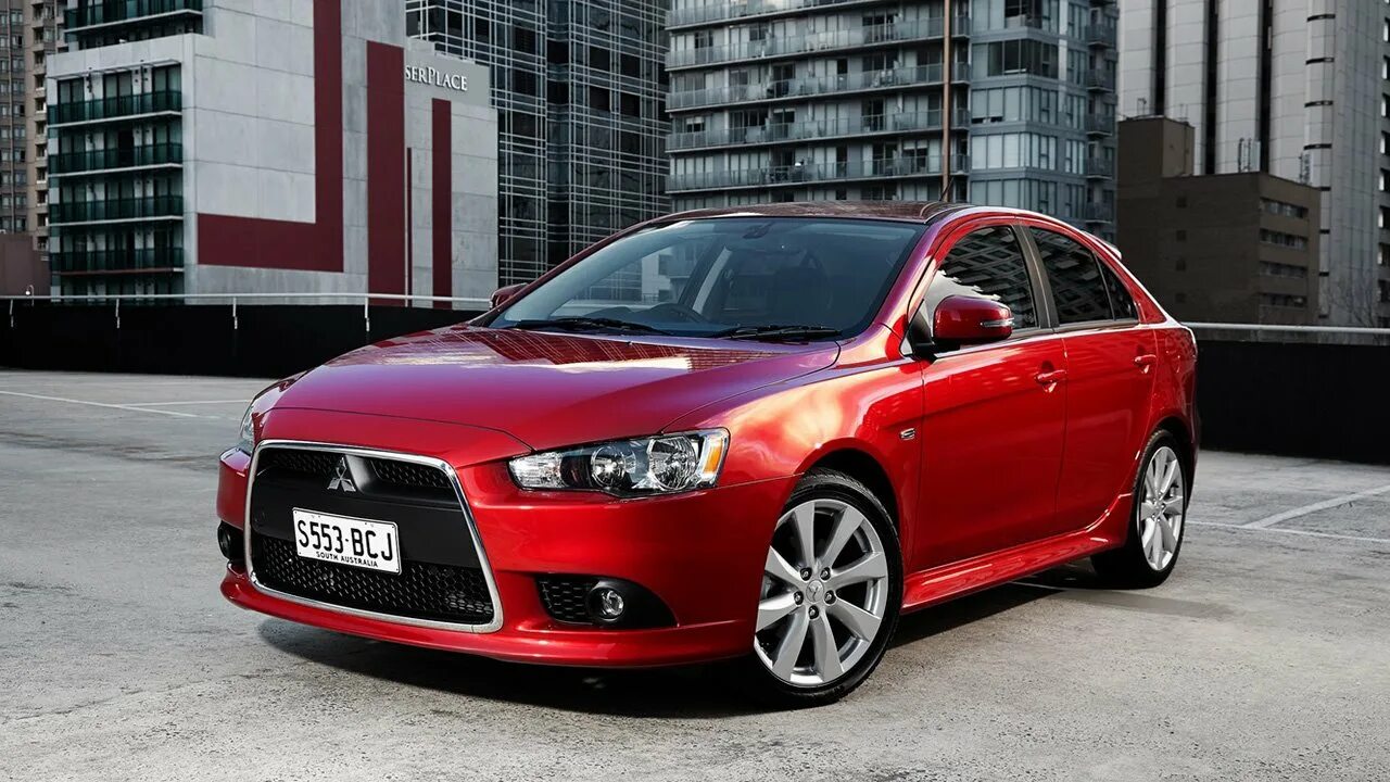 Митсубиси лансер купить новый. Мицубиси ланцер 10. Mitsubishi Lancer 10 красный. Митсубиси Лансер 10 красный. Lancer Mitsubishi Lancer.