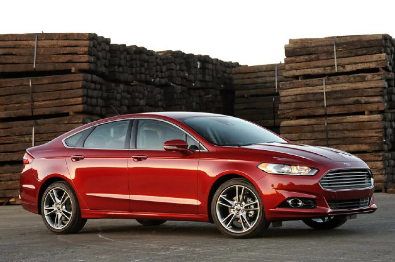 Фото 2015 года. Ford Fusion седан 2015. Форд Фьюжн седан 2015. Форд Фьюжн 2014 седан. Форд Фузион седан 2015.