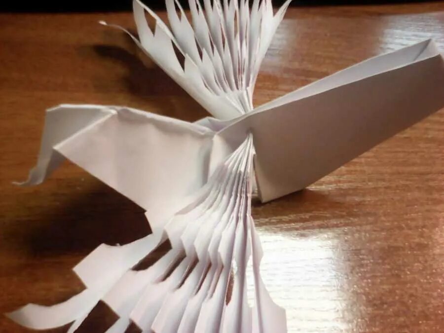 Счастье оригами. Птичка из бумаги. Птица счастья из бумаги. Птица счастья оригами. Птица счастья поделка из бумаги.