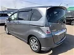 Фрид 2012 года гибрид. Honda freed 2012. Хонда Фрид серая. Хонда Фрид 2012 фиолетовый. Хонда Фрид 2012 машина.