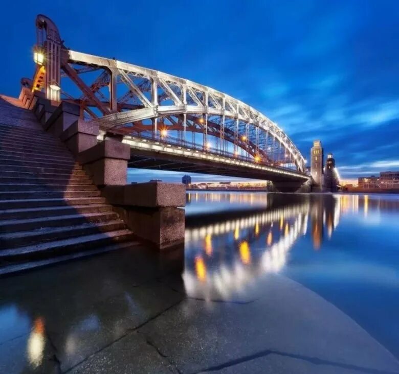 Большеохтинский мост. Мост Петра Великого в Санкт-Петербурге. Большеохтинский мост река. Новоохтинский мост СПБ.