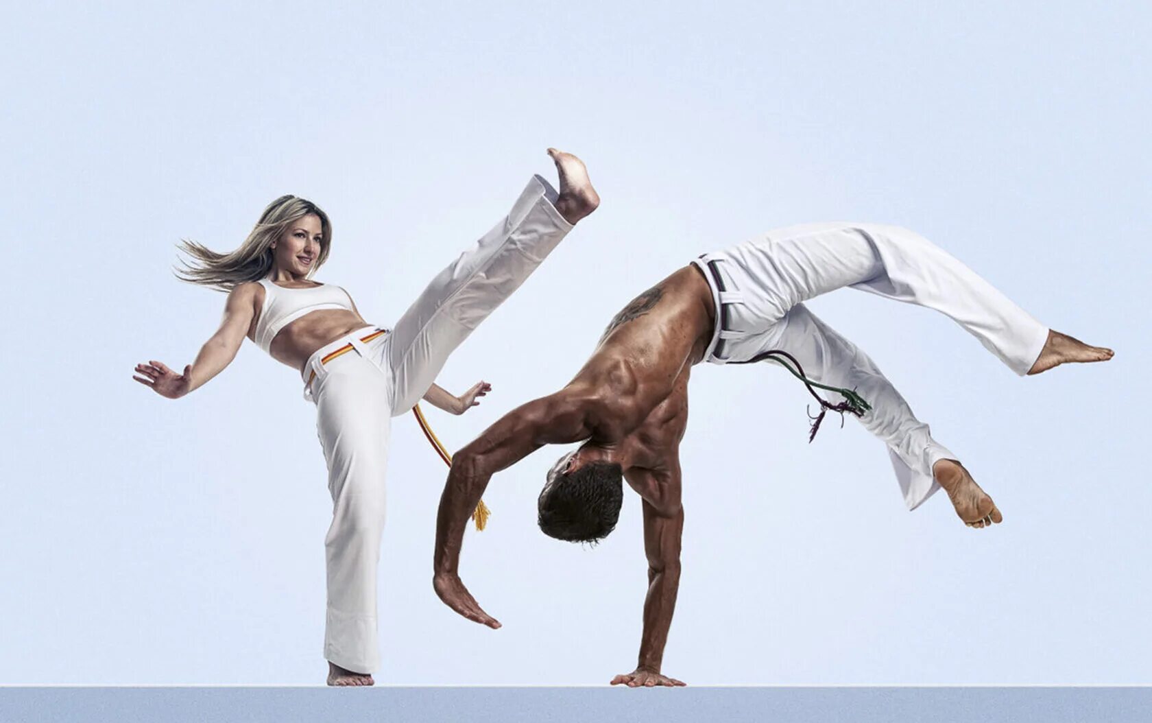 Капоэйра девушки. Капоэйра бразилия. Бразилия боевая капоэйра боевое искусство. Силат гайонг. Капоэйра танец.