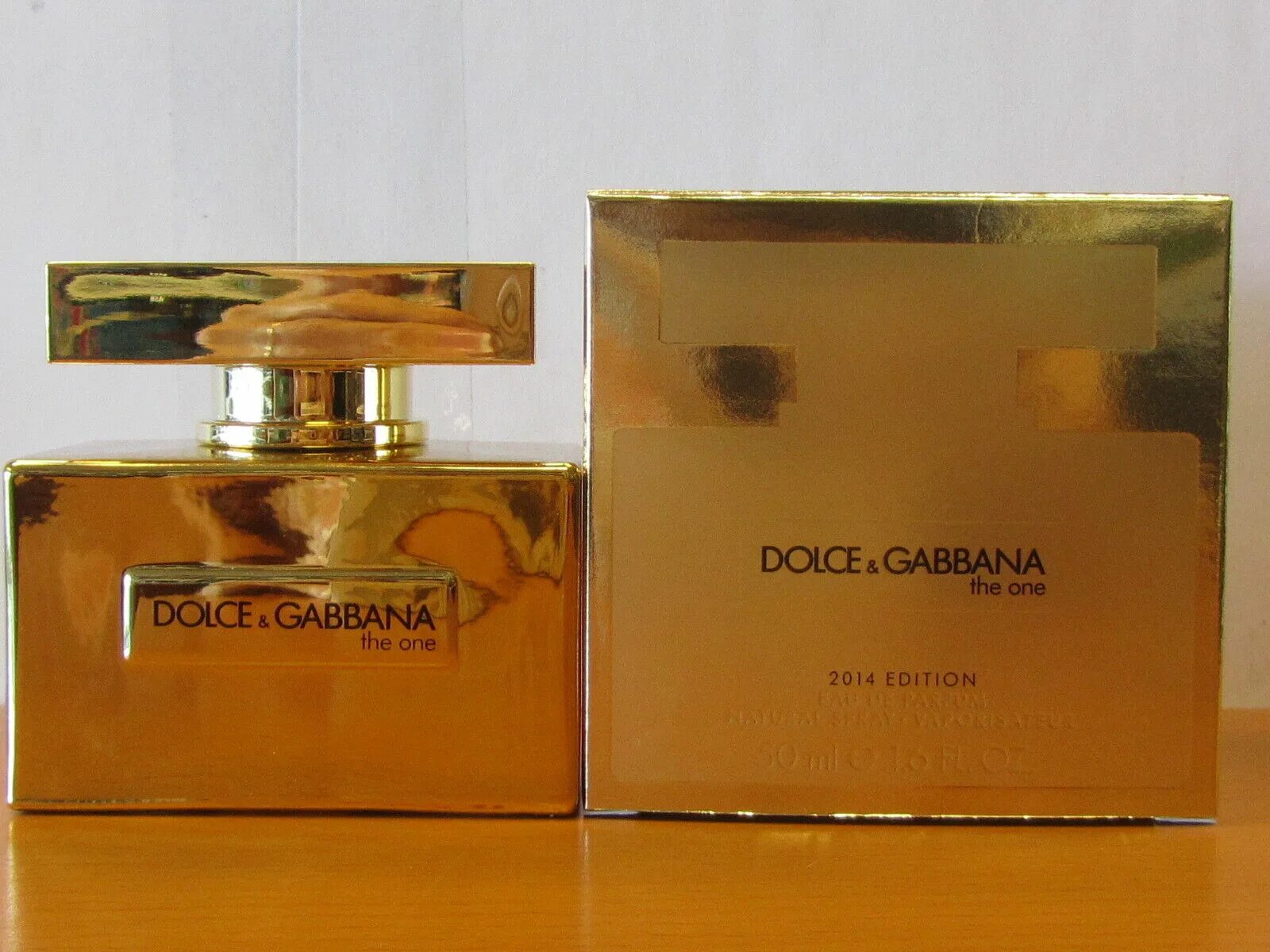 Dolce gabbana limited edition. Дольче Габбана духи женские золотые. Дольче Габбана Парфюм женский золотой. Духи Дольче Габбана Голд. Dolce Gabbana the one Gold женские.