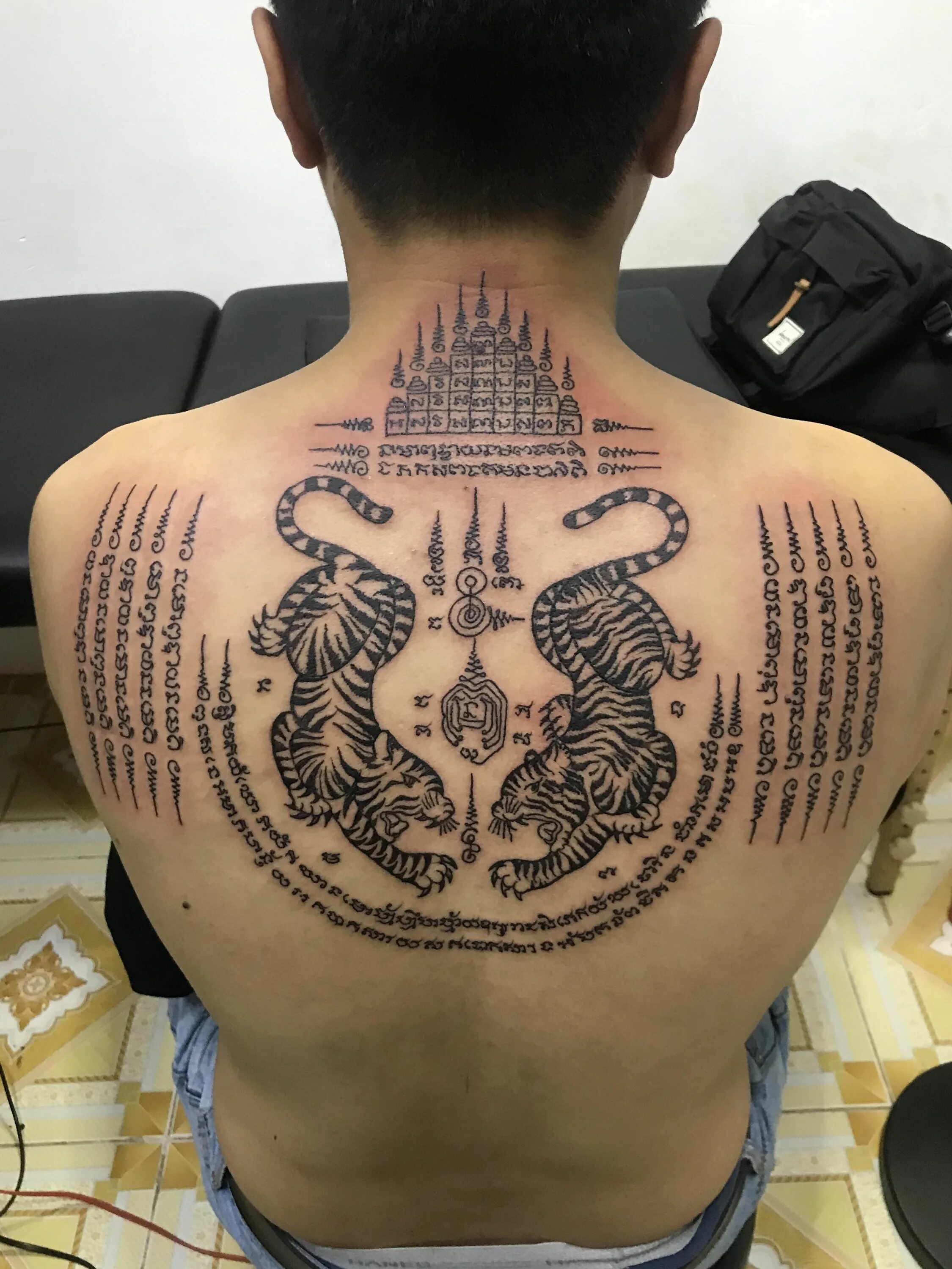 Татуировка сак. Тайские тату сак янт. тайские магические тату сак янт. сак янт тигр. сак янт лев.