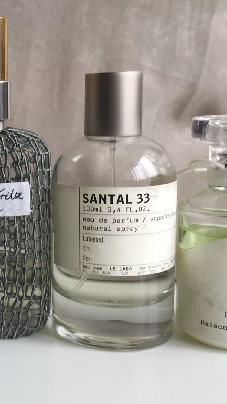 Флер сантал атар коллекшен. Сандал 33 Ле Лабо. Sandal 33 от le Labo. Сантал 33 духи. Le Labo Santal 33 этикетка.