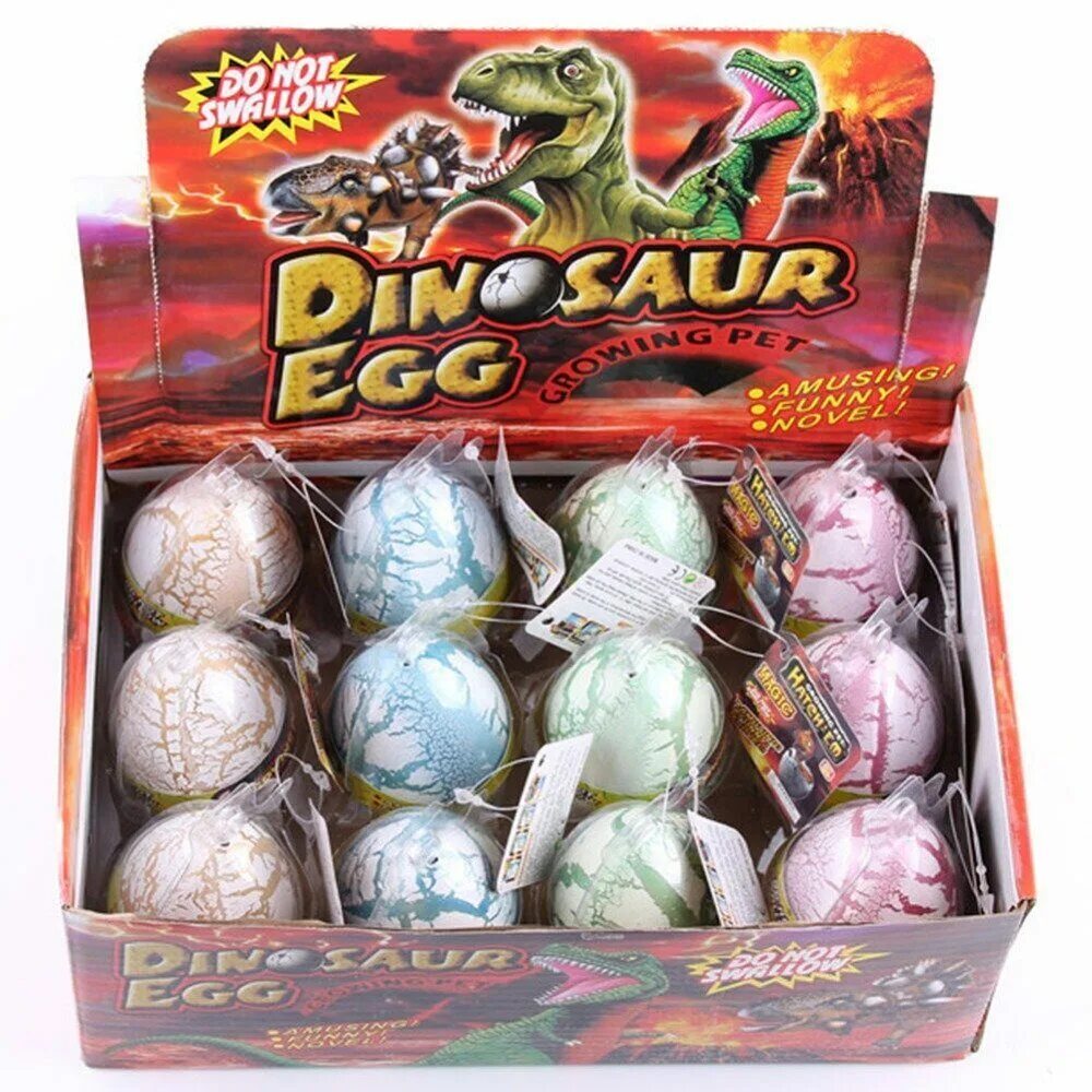 Яйца динозавров купить. Динозавр с яйцом. Игрушки драконы в яйцах. Игрушка в яйце. Игрушка яйцо динозавра растущее в воде.