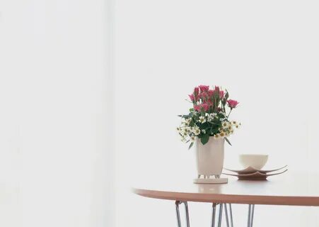 The vase is on the table