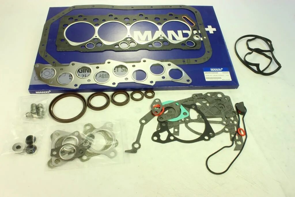 комплект прокладок двигателя 4. 1010100q2e. прокладка на двигатель toyota 5r. двигатель 5е тойота прокладка. двигатель трактора т40 комплект прокладок.