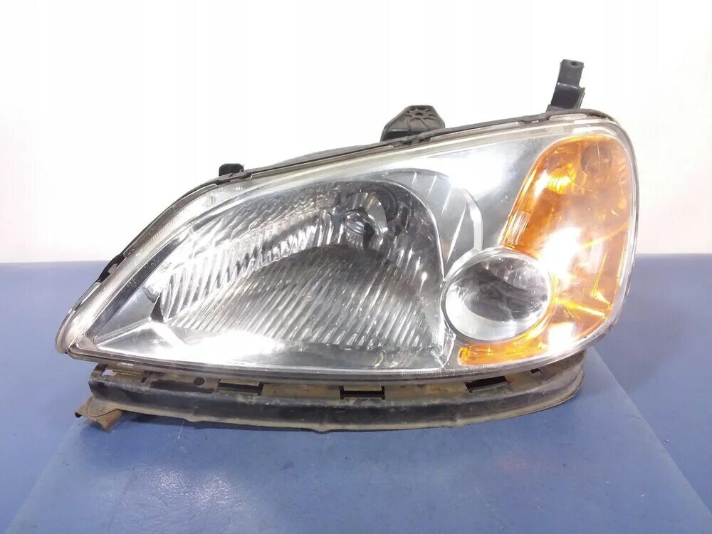 Фара хонда цивик 7. Фара хонда цивик 7. Хонда цивик 2003 фары. Honda civic 7 фары. Фара цивик ферио.