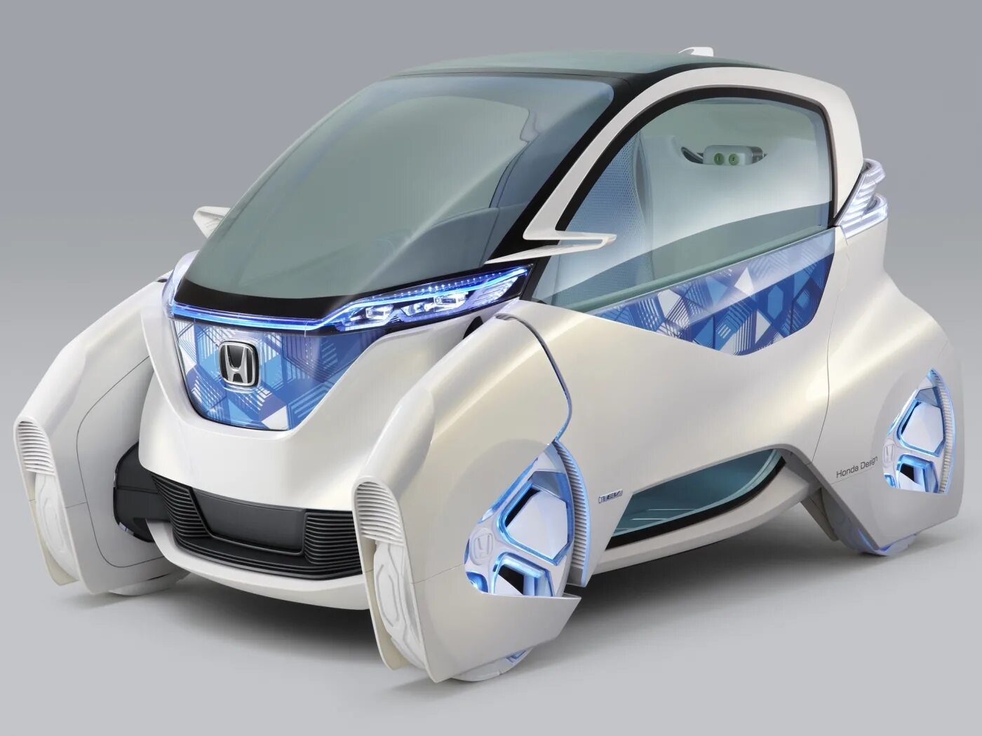 1 электронной автомобилей. Хонда электромобиль гибрид. Honda Micro Commuter. Электромобиль Монарх 2022. Электромобиль будущего.
