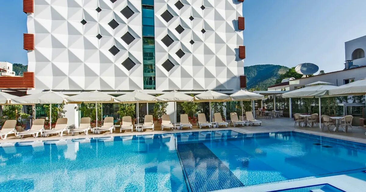 мармарис отели 4 звезды. Cettia beach resort 4. Sentido sea star 4 ичмелер турция. элит ворлд мармарис отель. Marmaris begonville beach 4*.