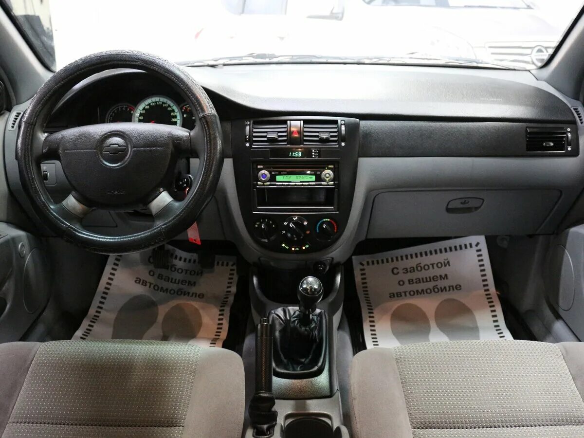 Lacetti 1.6 2010 комплектация. Шевроле Лачетти седан 1.4 салон. Шевроле Лачетти седан 1.6. Лачетти седан 1.6 салон. Шевроле лачетти хэтчбек автомат