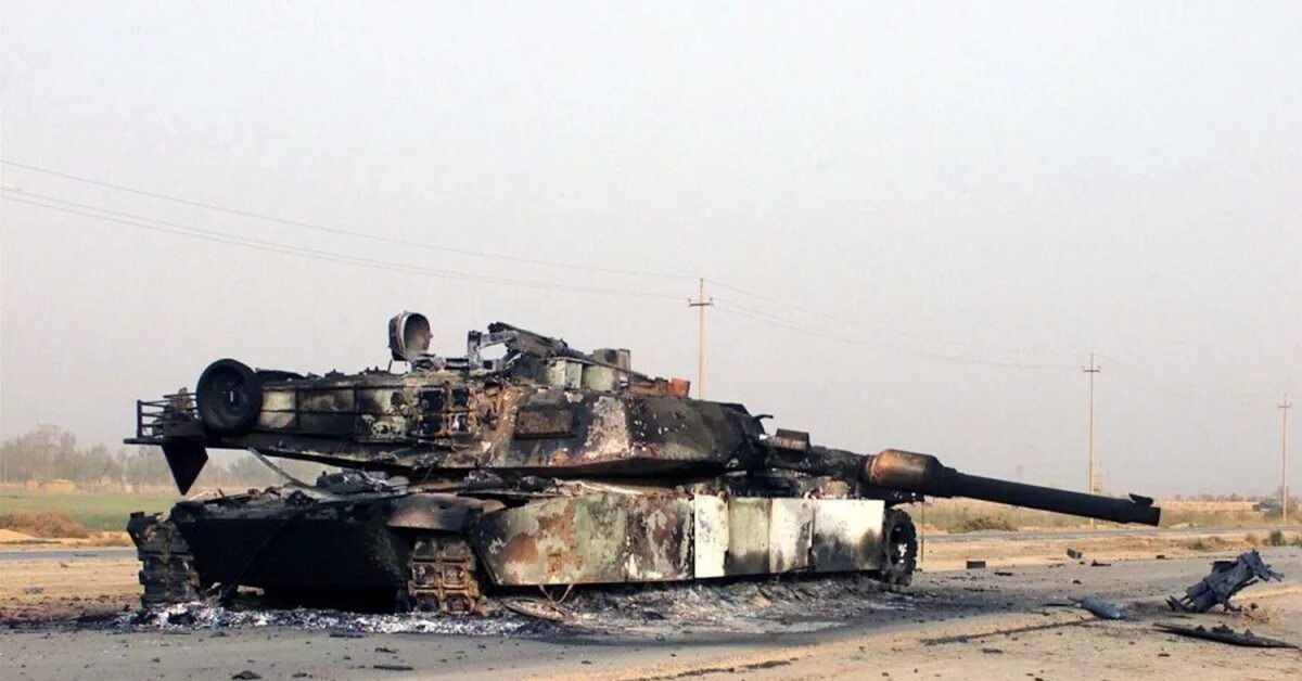 Сколько дали за абрамс. Подбитый танк Абрамс на Украине. Танк Leopard 2a6. Абрамс против т72 в Ираке.