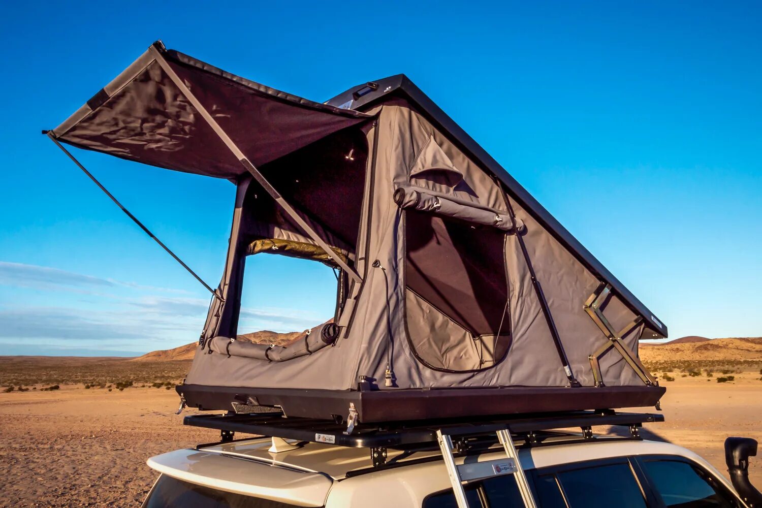 Куплю палатку на крышу автомобиля. Top Tent палатка на крышу. IKAMPER палатки на крышу авто. Палатка на крышу автодома. Кемпер с палаткой на крыше.