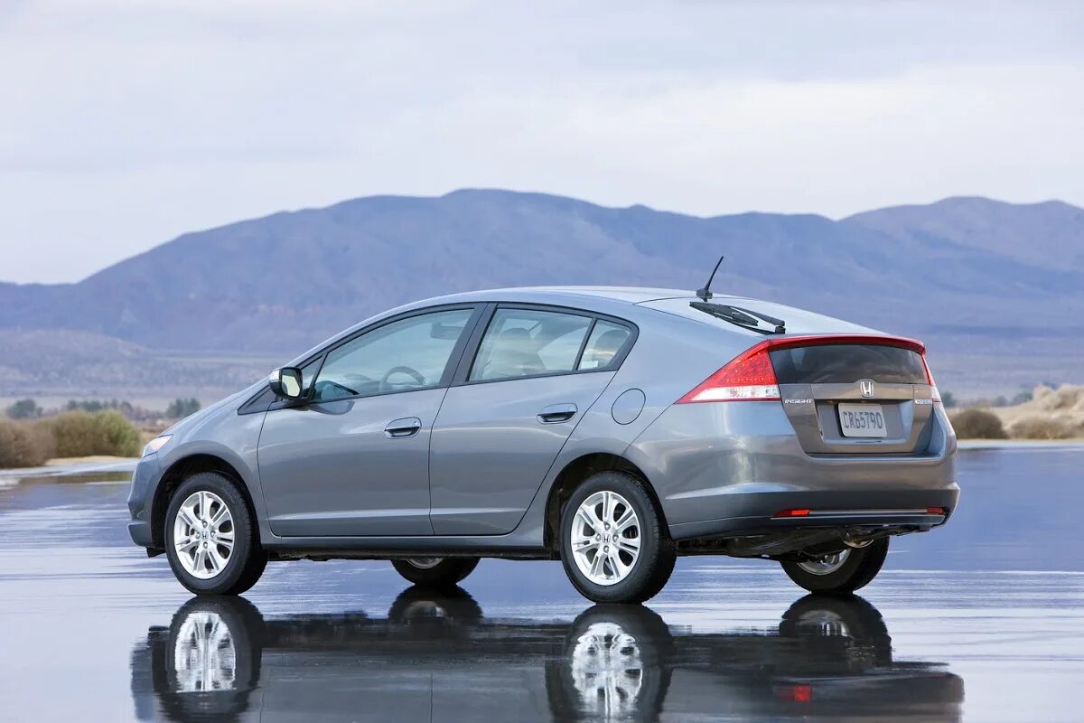 Инсайт 2010. Honda Insight 2010. Honda Insight II 2010. Honda Insight 2 поколение. Honda Insight 2010 гибрид.