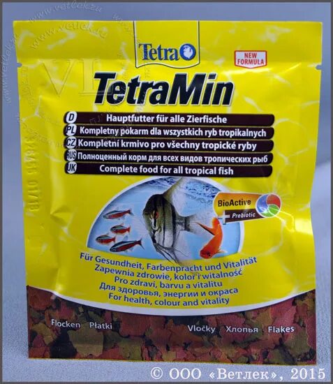 Тетра формула. Корм для гуппи. тетрамин. tetramin 12. tetra guppy mini flakes.