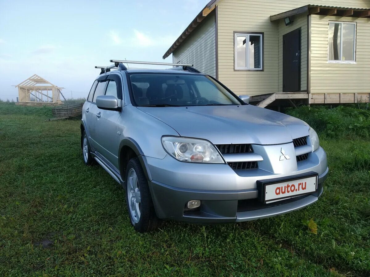 Полный привод аутлендер 1. Mitsubishi Outlander 1 поколение Рестайлинг. Полный привод Аутлендер 1 поколения. Silver Mitsubishi Outlander 1. Митсубиси Аутлендер 1 серебристый на резине МТ.