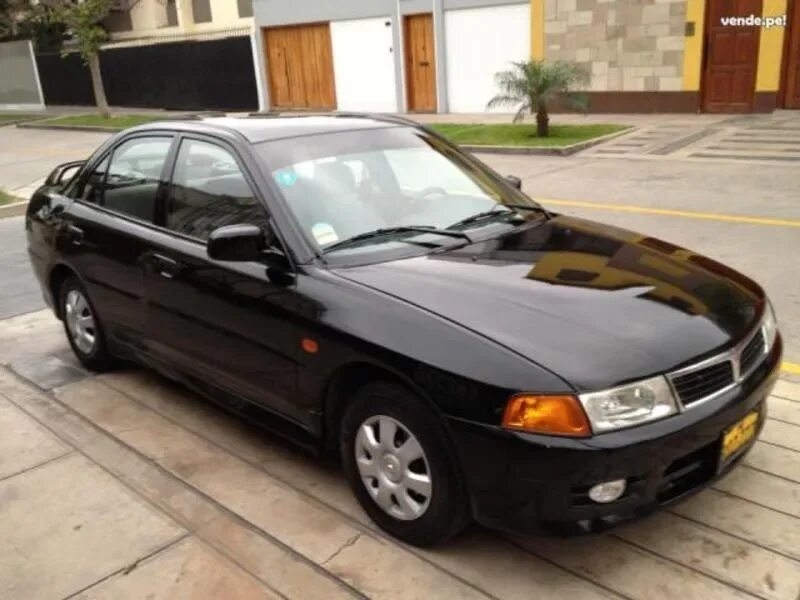 Mitsubishi Lancer 1998. Мицубиси Лансер 1998. Митсубиси Лансер 1998г. Митсубиси ланцер 1998.