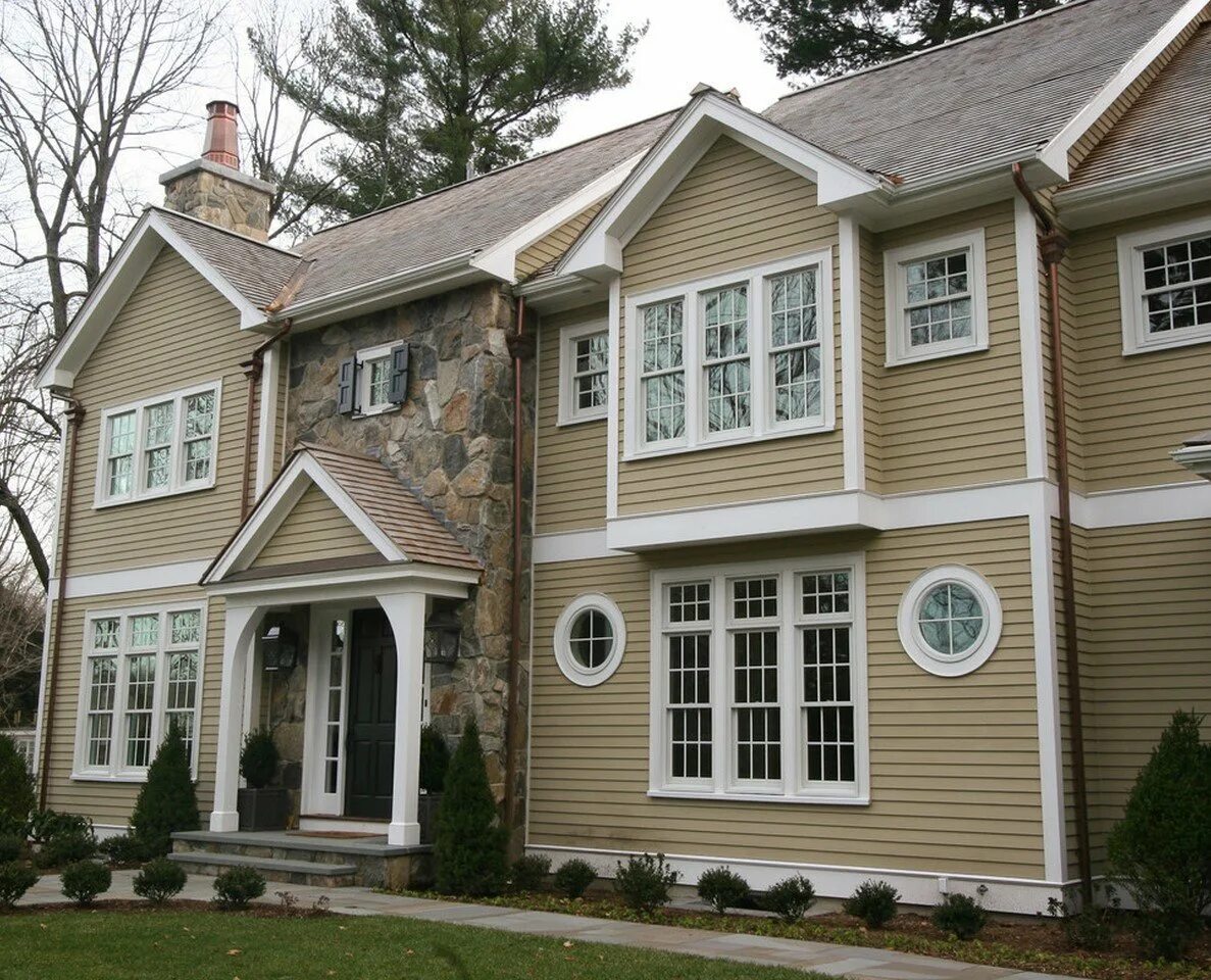 Фибросайдинг james hardie. Сайдинг елочка бежевый. Фибросайдинг james hardie. Фасады домов сайдинг. Сайдинг американка.