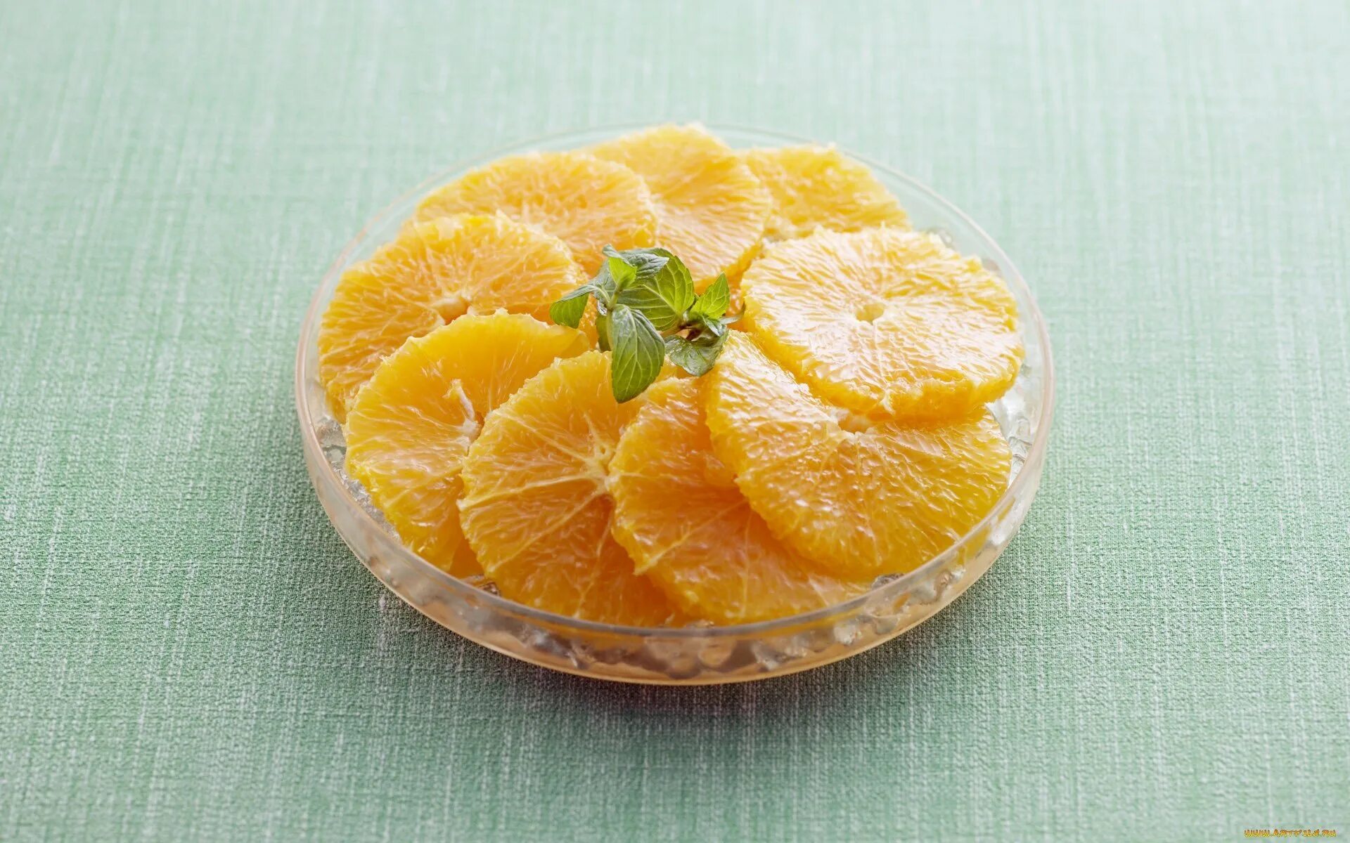 Апельсин повышает сахар. Нарезка апельсина. Красивая нарезка апельсина. Апельсин порезанный на дольки. Апельсиновые дольки.