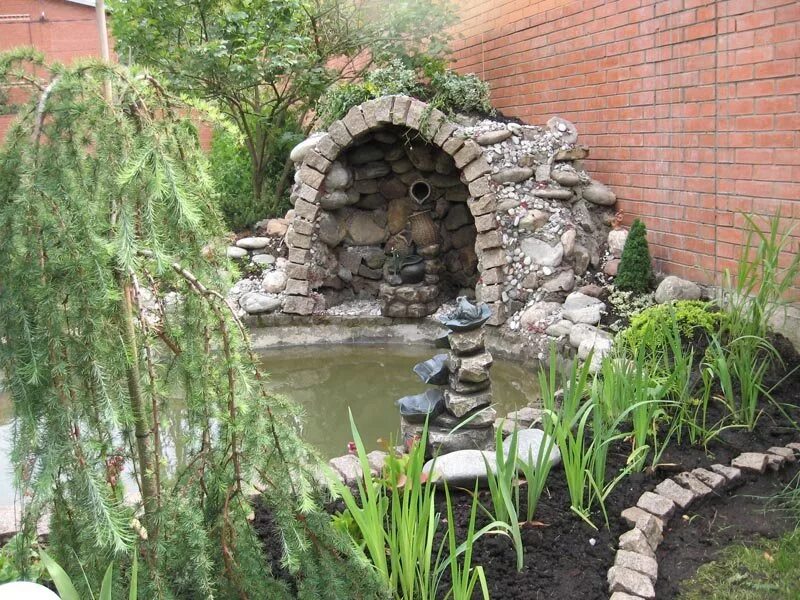 декоративные гроты. грот ландшафт скандинавия. альпийская горка. каменный грот на участке. каменный грот на участке.