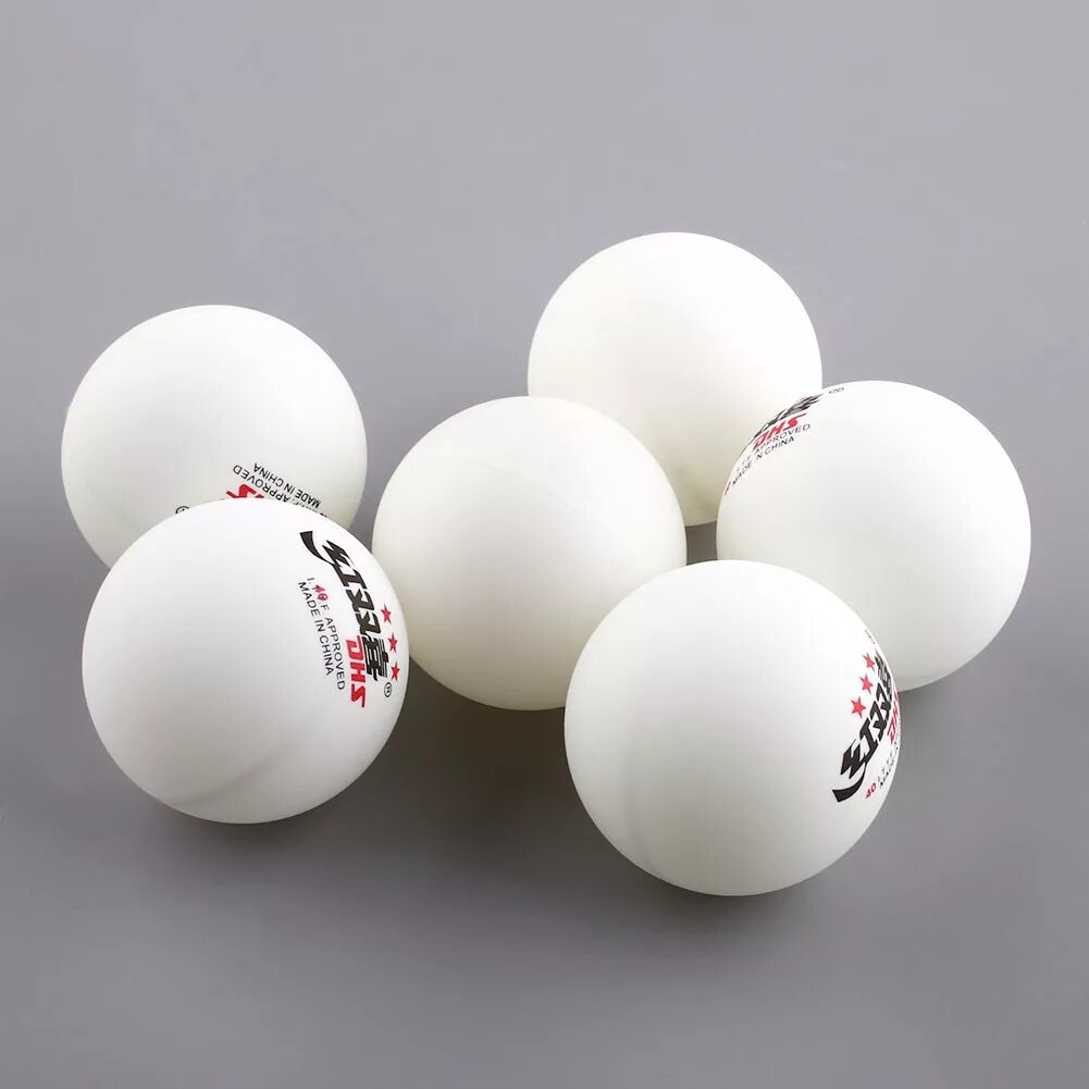 Мячи для настольного тенниса белые. Теннисный шарик DHS. Теннисный мяч для настольного тенниса. Теннисный мячик пинг понг. Теннисные мячи для пинг понга.