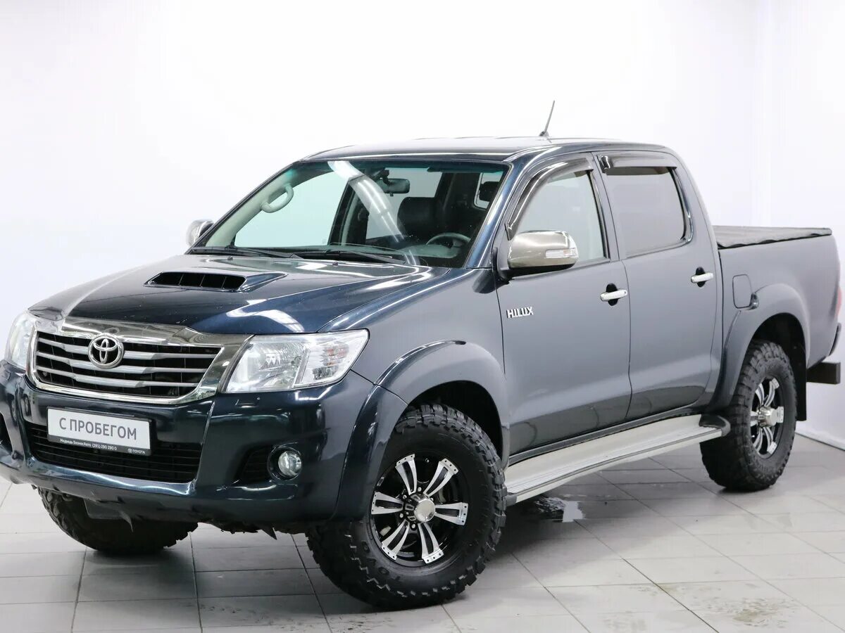 Хайлюкс 7 Рестайлинг. Toyota Hilux VII 2010. Hilux 7 Рестайлинг 2.5. Тойота Хайлюкс пикап белый дизель механика.