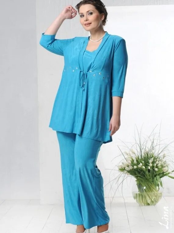 костюмы женские больших размеров на озоне. женские брючные костюмы больших размеров. спортивная одежда для полных женщин. туники с бриджами для полных. спортивный костюм женский для полных женщин.