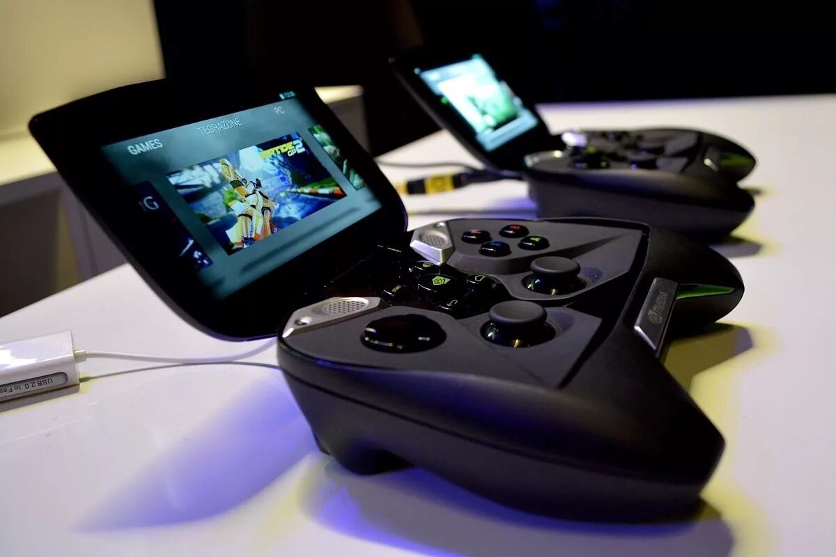 Топ портативных игровых. Игровая консоль NVIDIA Shield. NVIDIA Shield 2. Нвидиа Тегра приставка. Игровая приставка x12 Plus.