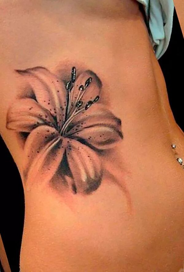 Татуировка лилия. Тату лилия на ноге. Тату лилия значение для девушек. Тату лилия. Тату лилия на плече.